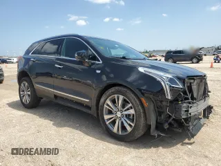 2022 Cadillac XT5 FWD Premium Luxury with VIN 1GYKNCRS0NZ178827, listed as a Copart auction lot 56200975 with 47,774 mi miles and Salvage title. Bid and sale history available at DreamBid. Image 4.
