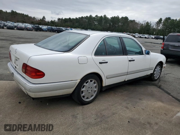 1996 Mercedes-Benz E-Class with VIN WDBJF55F5TJ022277, listed as a Copart auction lot 52597985 with 213,848 mi miles and Clean Title. Bid and sale history available at carsss.com. Image 3.