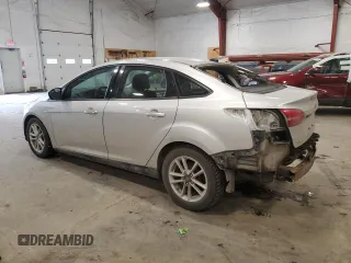 2018 Ford Focus SE z VIN 1FADP3F24JL315154, wystawiony jako Copart lot #53609185 z przebiegiem 76 216 mil mil oraz Szkoda całkowita • Salvage title. Historia ofert i sprzedaży dostępna na DreamBid. Obrazek 2.