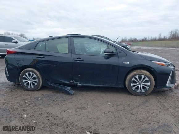 2021 Toyota Prius Prime LE with VIN JTDKAMFP2M3165859, listed as a IAAI auction lot 41943098 with 20,306 mi miles. Bid and sale history available at carsss.com. Image 14.