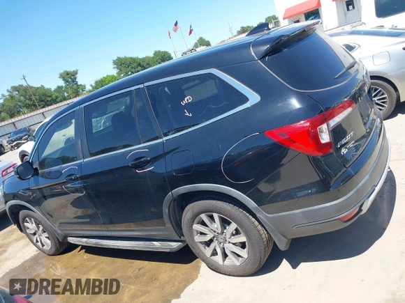 2019 Honda Pilot EX-L with VIN 5FNYF5H56KB042918, listed as a IAAI auction lot 42040516 with 113,433 mi miles and . Bid and sale history available at DreamBid. Image 15.