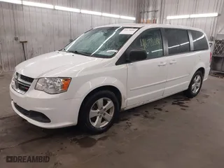 2016 Dodge Grand Caravan American Value Pkg with VIN 2C4RDGBG5GR140057, listed as a IAAI auction lot 41678086 with 75,420 mi miles. Bid and sale history available at carsss.com. Image 19.