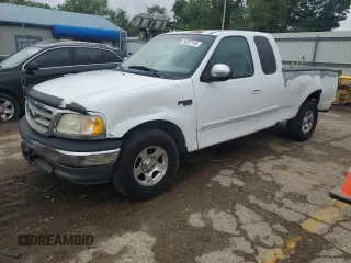 2002 Ford F-150 XL with VIN 1FTRX17L52KC49698, listed as a Copart auction lot 54307145 with 254,394 mi miles and Salvage title. Bid and sale history available at DreamBid. Image 1.