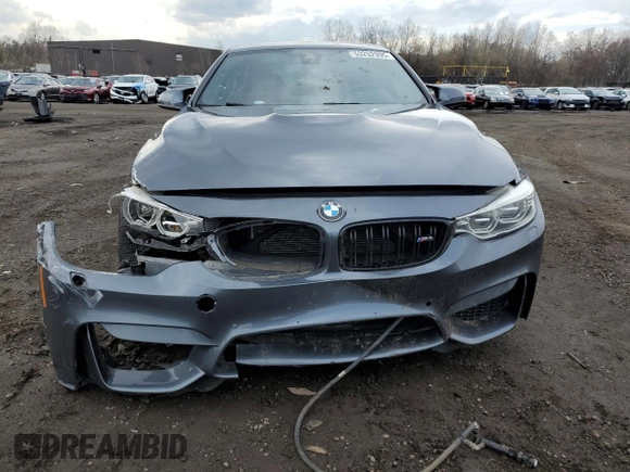 2015 BMW M4 z VIN WBS3R9C57FK329427, wystawiony jako Copart lot #53252995 z przebiegiem 94 039 mil mil oraz Szkoda całkowita • Salvage title. Historia ofert i sprzedaży dostępna na DreamBid. Obrazek 5.