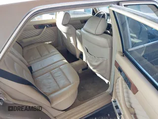 1990 Mercedes-Benz 560 with VIN WDBCA39E7LA505668, listed as a IAAI auction lot 41473380 with 159,716 mi miles and . Bid and sale history available at DreamBid. Image 8.