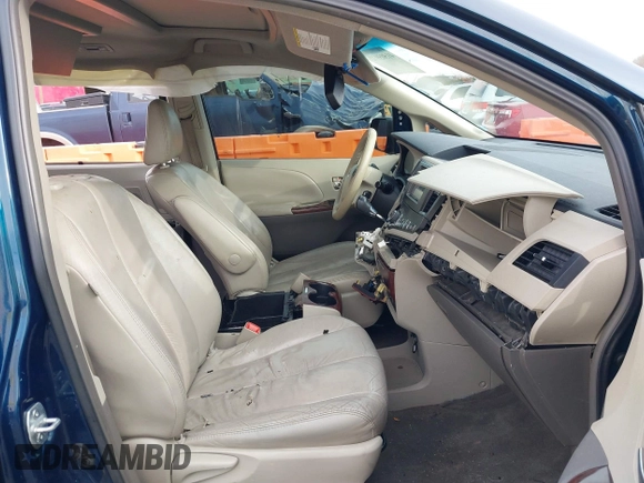 2011 Toyota Sienna XLE AAS with VIN 5TDYK3DCXBS113103, listed as a IAAI auction lot 41505972 with 170,919 mi miles and . Bid and sale history available at DreamBid. Image 5.