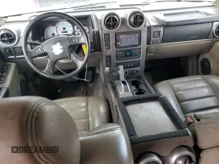 2004 Hummer H2 z VIN 5GRGN23U94H109105, wystawiony jako Copart lot #60548255 z przebiegiem 218 770 mil mil oraz Czysty tytuł • Clean title. Historia ofert i sprzedaży dostępna na DreamBid. Obrazek 8.