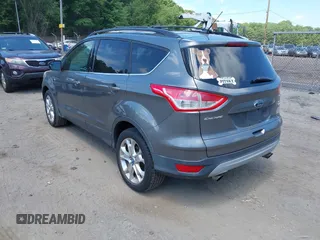 2013 Ford Escape SE with VIN 1FMCU9GXXDUA97162, listed as a IAAI auction lot 42633382 with 74,375 mi miles and . Bid and sale history available at DreamBid. Image 3.