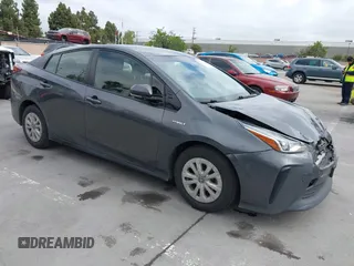2019 Toyota Prius L Eco z VIN JTDKARFU9K3075219, wystawiony jako IAAI lot #42113323 z przebiegiem 218 986 mil mil oraz . Historia ofert i sprzedaży dostępna na DreamBid. Obrazek 1.