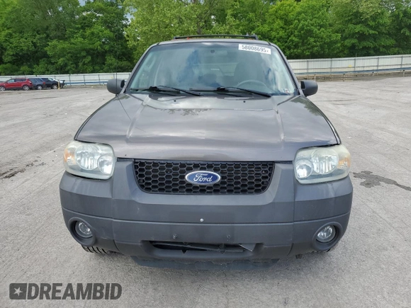 2006 Ford Escape XLT with VIN 1FMYU03136KD47701, listed as a Copart auction lot 58008695 with 176,341 mi miles and Salvage title. Bid and sale history available at DreamBid. Image 5.