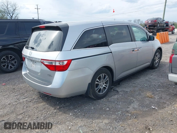 2012 Honda Odyssey EX-L with VIN 5FNRL5H68CB131431, listed as a IAAI auction lot 42012749 with 245,649 mi miles and . Bid and sale history available at carsss.com. Image 4.