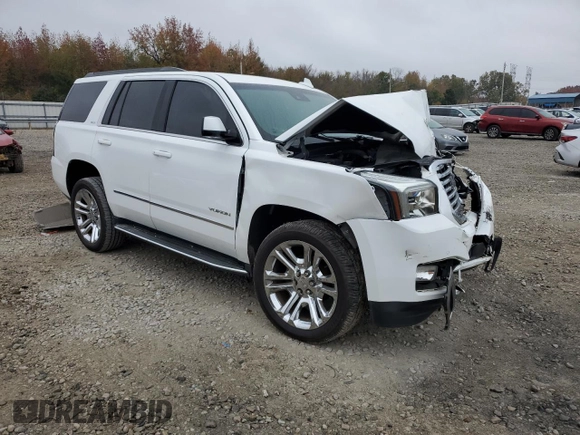 2019 GMC Yukon SLT with VIN 1GKS2BKC2KR338007, listed as a Copart auction lot 82336394 with 105,087 mi miles and Salvage Title. Bid and sale history available at carsss.com. Image 4.