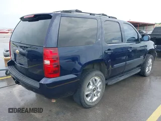 2007 Chevrolet Tahoe LT with VIN 1GNFC13J47R244713, listed as a IAAI auction lot 42632365 with 196,527 mi miles and . Bid and sale history available at DreamBid. Image 4.