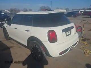 2021 MINI Hardtop 4 Door Cooper S with VIN WMWXU9C00M2P04693, listed as a IAAI auction lot 41785185 with 57,848 mi miles and . Bid and sale history available at DreamBid. Image 3.