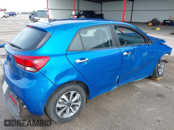 2023 Kia Rio S with VIN 3KPA25AD4PE558982, listed as a IAAI auction lot 41338270 with 40,965 mi miles and . Bid and sale history available at DreamBid. Image 4.