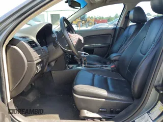 2012 Ford Fusion SEL z VIN 3FAHP0JA1CR182047, wystawiony jako Copart lot #56521525 z przebiegiem 200 523 mil mil oraz Szkoda całkowita • Salvage title. Historia ofert i sprzedaży dostępna na DreamBid. Obrazek 7.