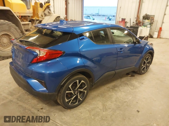2019 Toyota C-HR XLE with VIN JTNKHMBX0K1042342, listed as a IAAI auction lot 41935879 with 54,190 mi miles and . Bid and sale history available at DreamBid. Image 4.
