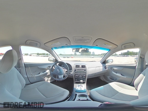 2010 Toyota Corolla with VIN 1NXBU4EE6AZ306666, listed as a Copart auction lot 58370215 with 128,586 mi miles and Salvage title. Bid and sale history available at DreamBid. Image 14.