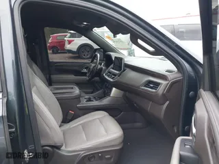2021 Chevrolet Suburban LT with VIN 1GNSCCKD9MR266207, listed as a IAAI auction lot 41731079 with 107,761 mi miles. Bid and sale history available at carsss.com. Image 5.
