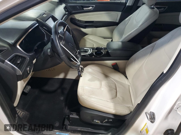 2015 Ford Edge Titanium z VIN 2FMTK4K80FBB73022, wystawiony jako Copart lot #53654035 z przebiegiem 155 848 mil mil oraz Szkoda całkowita • Salvage title. Historia ofert i sprzedaży dostępna na DreamBid. Obrazek 7.