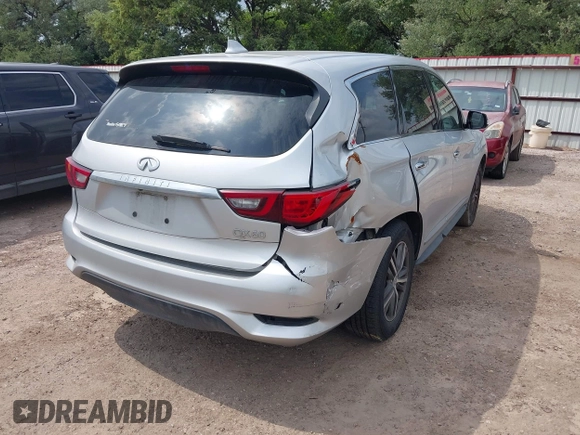2019 Infiniti QX60 Luxe with VIN 5N1DL0MN0KC511333, listed as a IAAI auction lot 42070088 with 117,796 mi miles and . Bid and sale history available at DreamBid. Image 6.