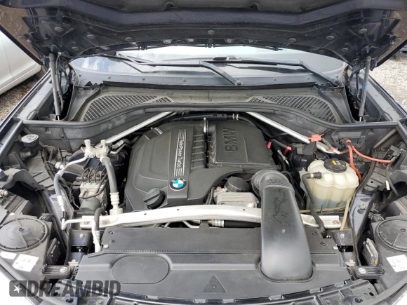 2017 BMW X5 xDrive35i z VIN 5UXKR0C50H0V66241, wystawiony jako Copart lot #55552565 z przebiegiem 108 245 mil mil oraz Szkoda całkowita • Salvage title. Historia ofert i sprzedaży dostępna na DreamBid. Obrazek 12.