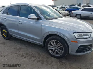 2018 Audi Q3 Premium Plus with VIN WA1JCCFS0JR023016, listed as a IAAI auction lot 41591930 with 102,672 mi miles. Bid and sale history available at carsss.com. Image 1.