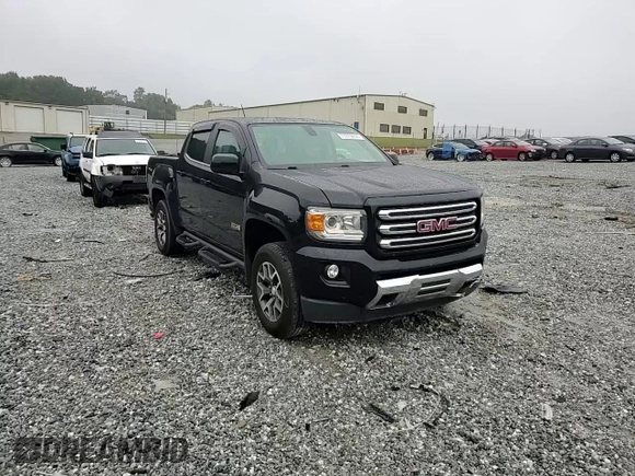 2015 GMC Canyon 4WD SLE with VIN 1GTG6BE37F1157166, listed as a Copart auction lot 71279914 with 114,484 mi miles and Salvage Title. Bid and sale history available at carsss.com. Image 11.