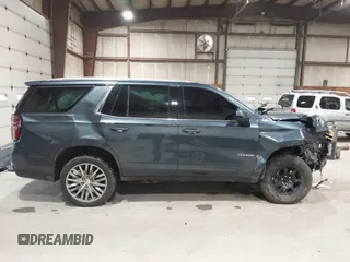2021 Chevrolet Tahoe LT z VIN 1GNSKNKD5MR354265, wystawiony jako IAAI lot #42331890 z przebiegiem 106 250 mil mil oraz . Historia ofert i sprzedaży dostępna na DreamBid. Obrazek 14.