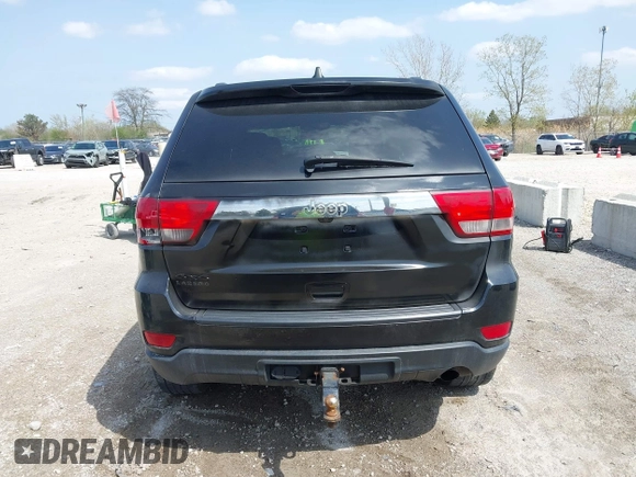 2014 Jeep Grand Cherokee Laredo with VIN 1C4RJFAG1EC315544, listed as a IAAI auction lot 42105987 with 164,430 mi miles. Bid and sale history available at carsss.com. Image 16.