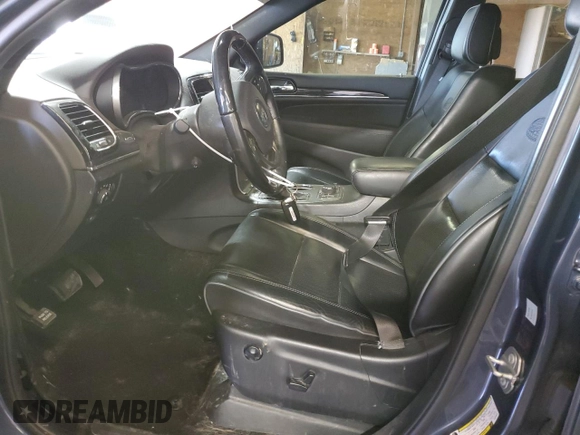 2020 Jeep Grand Cherokee Overland with VIN 1C4RJFCG4LC231616, listed as a Copart auction lot 49303645 with 66,043 mi miles and Salvage Title. Bid and sale history available at DreamBid. Image 7.