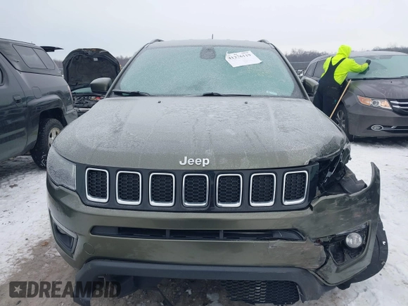 2018 Jeep Compass Altitude with VIN 3C4NJDBB1JT479462, listed as a IAAI auction lot 41276119 with 58,895 mi miles and . Bid and sale history available at carsss.com. Image 12.