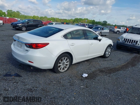 2014 Mazda 6 i Sport with VIN JM1GJ1U62E1116690, listed as a IAAI auction lot 42082188 with 144,137 mi miles and . Bid and sale history available at DreamBid. Image 4.