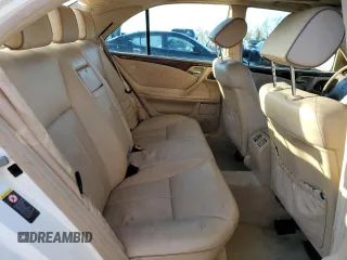 2002 Mercedes-Benz E-Class with VIN WDBJF65J62B423016, listed as a Copart auction lot 79806394 with 154,537 mi miles and Salvage Title. Bid and sale history available at carsss.com. Image 10.