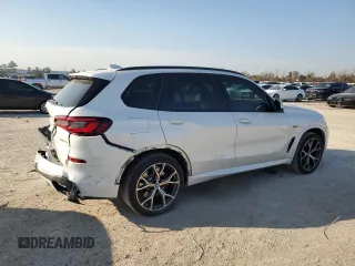2022 BMW X5 xDrive45e with VIN 5UXTA6C0XN9J37988, listed as a Copart auction lot 47203815 with 27,883 mi miles and Salvage Title. Bid and sale history available at carsss.com. Image 3.