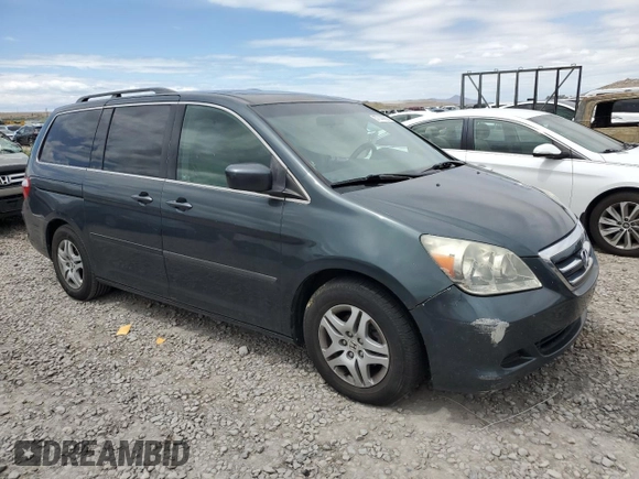 2006 Honda Odyssey EX-L z VIN 5FNRL38786B014188, wystawiony jako Copart lot #57140935 z przebiegiem Nie podano mil oraz Szkoda całkowita • Salvage title. Historia ofert i sprzedaży dostępna na DreamBid. Obrazek 4.