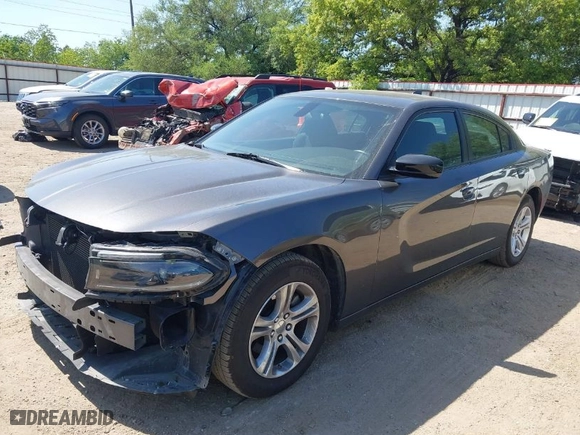 2023 Dodge Charger SXT with VIN 2C3CDXBG4PH515632, listed as a IAAI auction lot 42000682 with 56,163 mi miles. Bid and sale history available at carsss.com. Image 2.