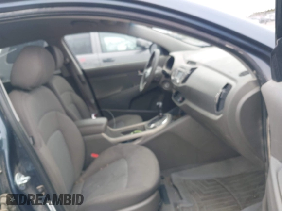 2014 Kia Sportage LX with VIN KNDPBCAC4E7585800, listed as a IAAI auction lot 42126740 with 193,573 mi miles and . Bid and sale history available at carsss.com. Image 5.