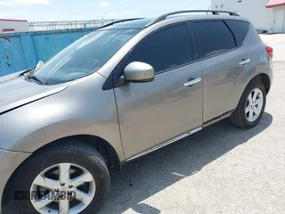 2009 Nissan Murano SL z VIN JN8AZ18U69W025703, wystawiony jako IAAI lot #42454283 z przebiegiem 141 133 mil mil oraz . Historia ofert i sprzedaży dostępna na DreamBid. Obrazek 6.