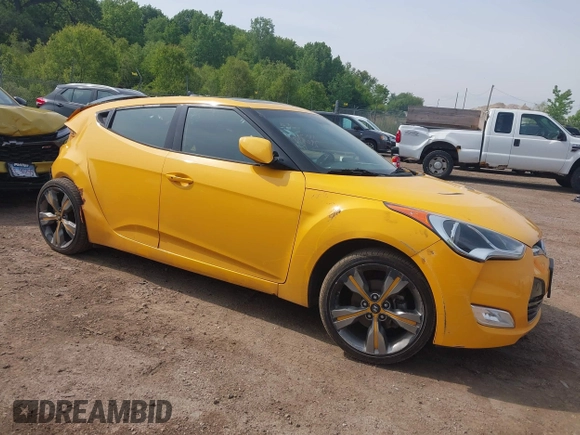 2013 Hyundai Veloster w/Black Int with VIN KMHTC6AD7DU161769, listed as a IAAI auction lot 42448221 with 139,936 mi miles and . Bid and sale history available at DreamBid. Image 1.