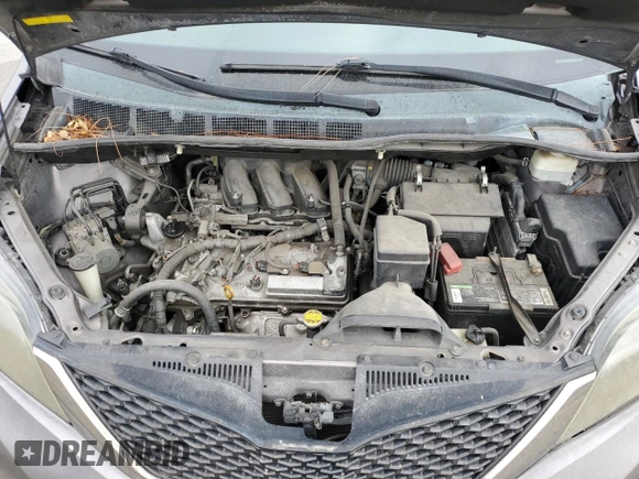 2011 Toyota Sienna SE with VIN 5TDXK3DC0BS121254, listed as a Copart auction lot 58588875 with 151,334 mi miles and Salvage title. Bid and sale history available at DreamBid. Image 12.