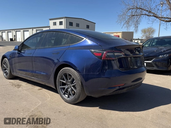 2023 Tesla Model 3 Long Range with VIN 5YJ3E1EB1PF625677, listed as a Copart auction lot 52424245 with 12,817 mi miles and Salvage Title. Bid and sale history available at DreamBid. Image 3.