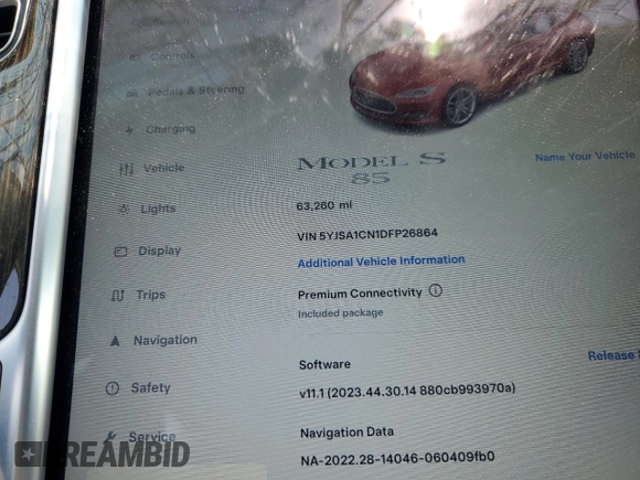 2013 Tesla Model S with VIN 5YJSA1CN1DFP26864, listed as a Copart auction lot 52029485 with 63,260 mi miles and Salvage Title. Bid and sale history available at DreamBid. Image 9.