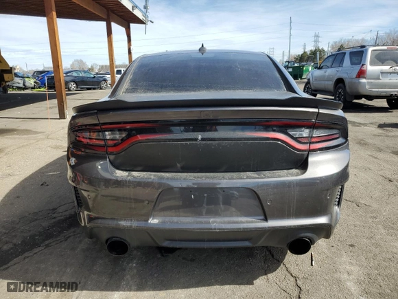 2021 Dodge Charger Scat Pack with VIN 2C3CDXGJ5MH602049, listed as a Copart auction lot 46069295 with 21,462 mi miles and Salvage Title. Bid and sale history available at carsss.com. Image 6.