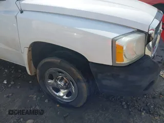 2005 Dodge Dakota ST with VIN 1D7HE22K75S160795, listed as a IAAI auction lot 41569099 with 254,592 mi miles and . Bid and sale history available at DreamBid. Image 14.