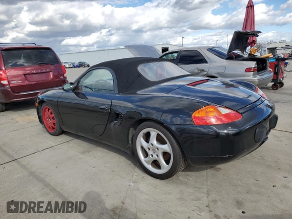 2000 Porsche Boxster z VIN WP0CA2988YU627807, wystawiony jako Copart lot #45522955 z przebiegiem 120 384 mil mil oraz Szkody całkowita. Historia ofert i sprzedaży dostępna na DreamBid. Obrazek 2.
