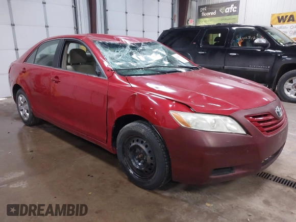 2009 Toyota Camry with VIN 4T4BE46K79R110464, listed as a IAAI auction lot 42108337 with 212,128 mi miles. Bid and sale history available at carsss.com. Image 1.