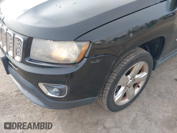 2014 Jeep Compass Limited with VIN 1C4NJDCB9ED549543, listed as a IAAI auction lot 41938699 with 195,973 mi miles. Bid and sale history available at carsss.com. Image 6.