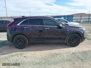 2020 Cadillac XT4 FWD Luxury with VIN 1GYAZAR48LF151119, listed as a IAAI auction lot 41327430 with 62,704 mi miles. Bid and sale history available at carsss.com. Image 13.