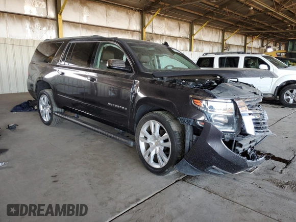 2017 Chevrolet Suburban Premier with VIN 1GNSCJKC8HR163863, listed as a Copart auction lot 78903514 with 142,212 mi miles and Salvage title. Bid and sale history available at DreamBid. Image 4.